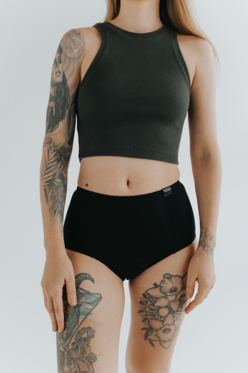 Model showcasing the new collection of period panties made from soft, breathable cotton. Stylish and eco-friendly design for comfortable menstrual protection.