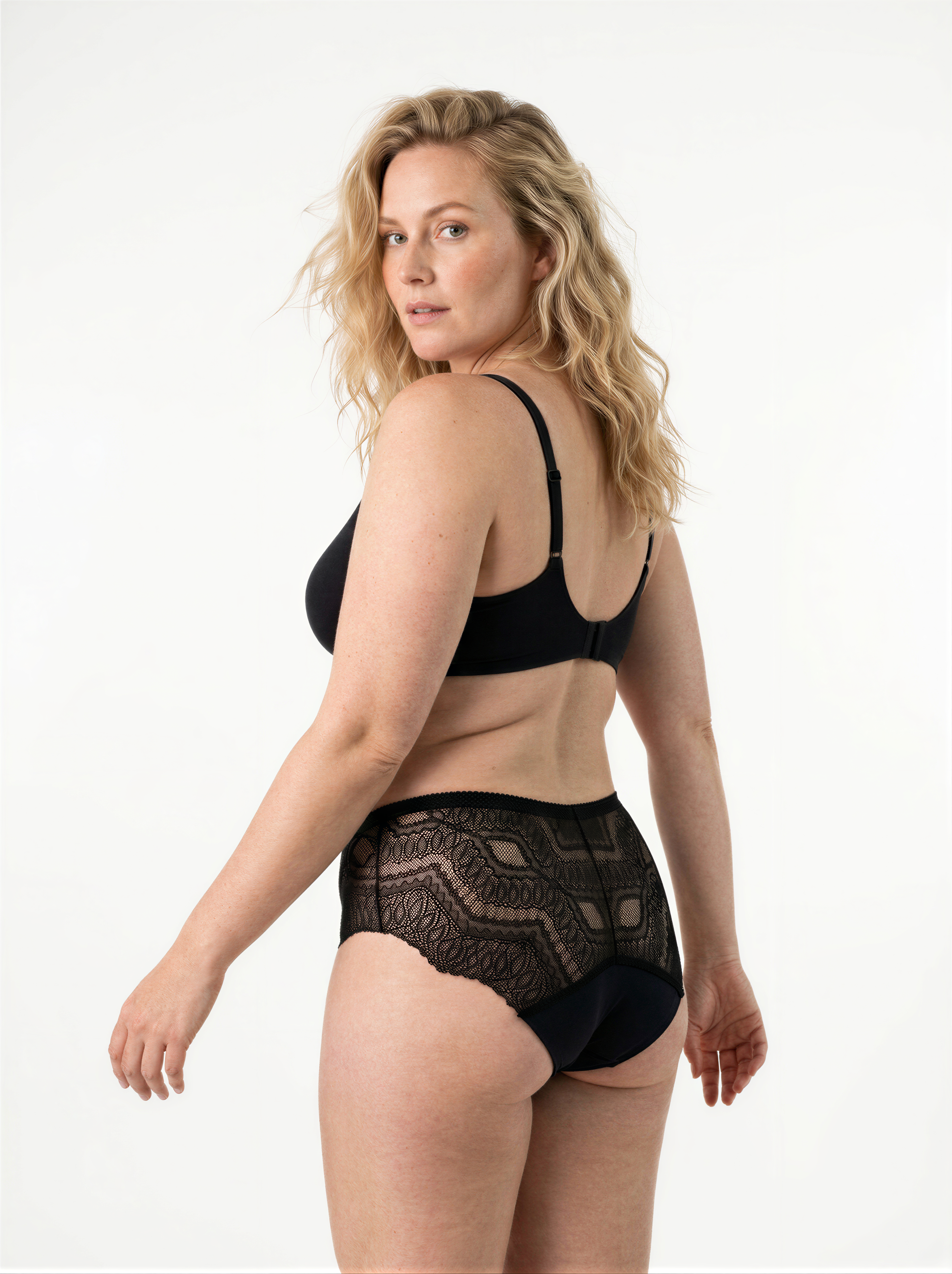 Model wearing black limited edition ALMA lace mid-rise period-proof lingerie
